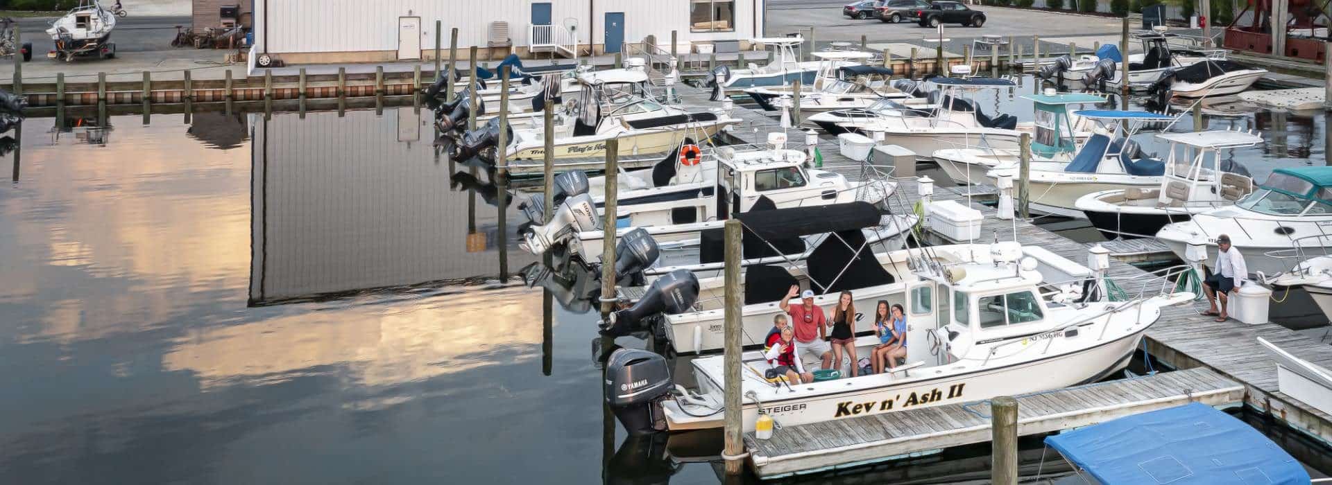 Multiple boats in slips in the harbor