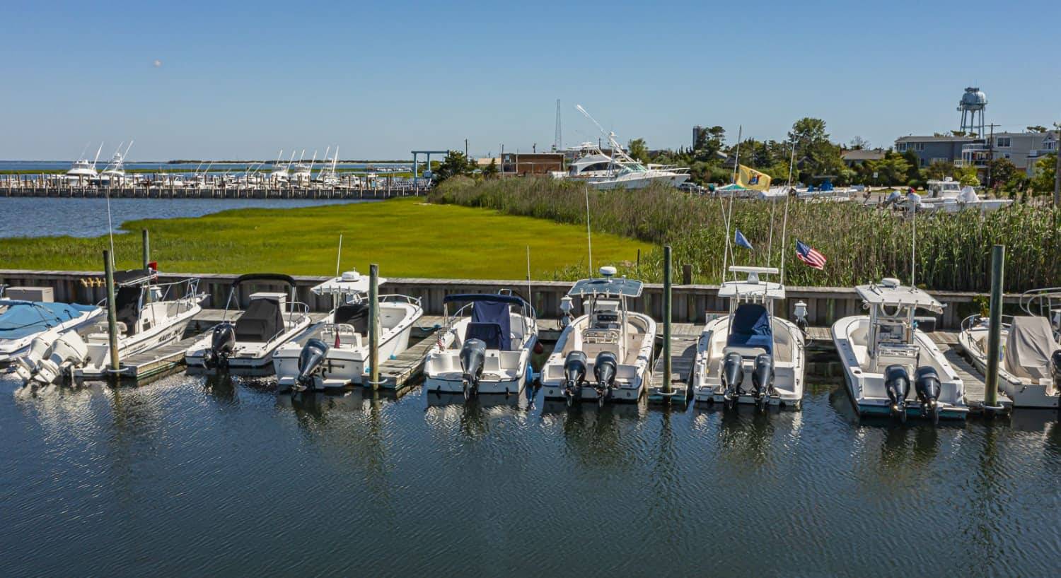 Multiple boats in slips in the harbor